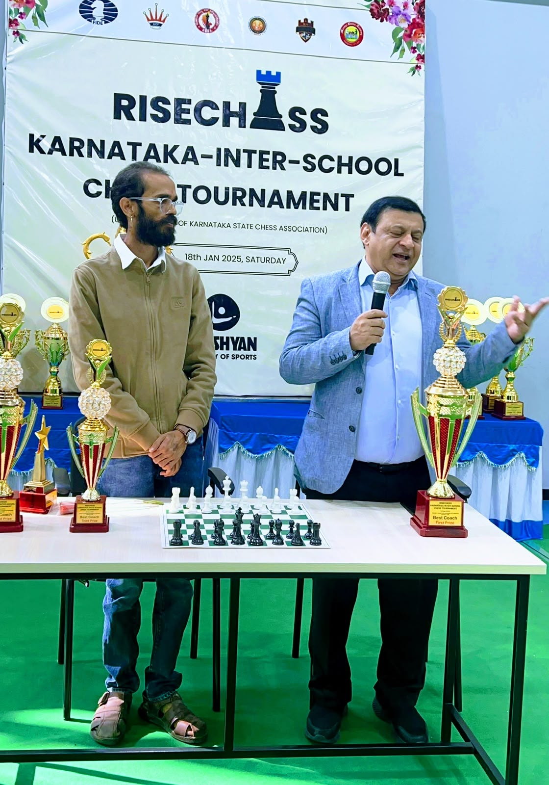 Deepak Thimaya speaking at the RISECHESS Karnataka inter-school chess tournament